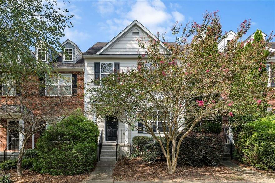 Beautifully maintained 2-bedroom, 2-bath townhome in the highly desirable Magnolias at Ridge Walk swim/tennis community! Conveniently located near Olde Rope Mill Park, Downtown Woodstock, and The Outlet Shoppes at Atlanta, this home offers the perfect blend of comfort and convenience. A charming front porch welcomes you into a bright, freshly painted interior with gleaming hardwood floors throughout the main level. The kitchen features stainless steel appliances and opens to a spacious dining area with access to a large back deck—ideal for entertaining. Relax in the inviting living room with a cozy fireplace. Upstairs, you’ll find generously sized bedrooms with ample closet space. The lower-level bonus room offers versatility, perfect for a home office, gym, or game room.