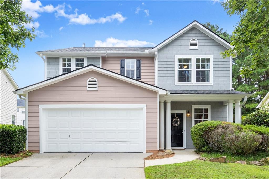 Welcome to this amazing move-in ready home located in a sought-after swim/tennis community! A charming covered front porch welcomes you inside to a bright and open main level featuring brand new LVP flooring throughout. The front room can be utilized as a formal living room or dining room. The spacious family room flows seamlessly into the large kitchen with beautiful new quartz countertops, stainless steel appliances including a gas range, refrigerator, and a built-in microwave, an oversized island with seating, a pantry and a large eat-in dining area. Upstairs, the generous primary suite offers a recently renovated bathroom with an updated vanity, new LVP flooring, a separate tub and shower, and a large custom walk-in closet. Three additional bedrooms share a guest bathroom with an updated vanity and LVP flooring, while a spacious laundry room adds extra convenience. The home also boasts a level driveway, level backyard and a 2-car garage, perfect for storage and everyday functionality. Recent updates in 2024 include a new roof, new paint, new carpet and new LVP flooring. This home has been meticulously maintained and thoughtfully updated — all that's left to do is move in! Amenities featured include swim, tennis, playground, clubhouse, lake and picnic area. Conveniently situated near shopping, major interstates, and the airport, this home offers both comfort and accessibility. Don’t miss your chance to make it yours! Amenities can be found at 7375 Parks Trl, Fairburn, GA 30213