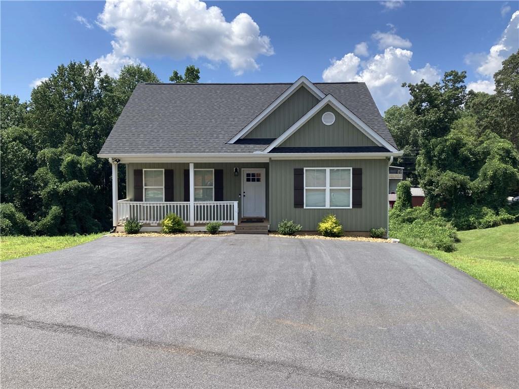Practically new this 3 bedroom 2.5 bath home is located only 1 mile from Walmart and 2 miles from UNG. Convenient to everything. Granite counter tops, stainless steel appliances, LVP flooring throughout, and a pool table in basement. Available now. NO pets , No smoking. Call now for more information or to schedule a showing.