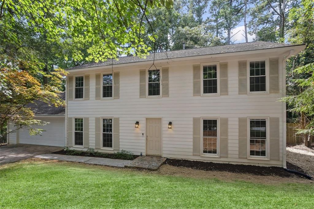 Step inside and feel the calm of 985 Lake Haven Ct. This home welcomes you with warmth and balance, where thoughtful design (including newer appliances, new HVAC, new flooring and fresh paint) and inviting spaces make daily life flow with ease. At the heart is a striking stone fireplace—It’s the kind of feature that draws people together, whether for quiet evenings or moments of celebration.
The kitchen, expansive, open and updated, is designed to support life as it happens. Morning light filters across the counters, casual meals stretch into conversation, and gatherings unfold naturally around the table.
The level, shaded lot offers room to play, garden, or unwind, while the cul-de-sac setting creates a rare combination of privacy and community. There’s space here for a firepit, a swing, or simply the quiet enjoyment of a cool summer afternoon or a Fall evening watching College Football.
Tucked in a desirable, quiet neighborhood, yet close to everything, this home provides both retreat and convenience. Restaurants, shops, schools (highy rated) and everyday essentials are nearby, while GA400 makes commuting effortless. The details of this home work together to make it special, creating a lifestyle that feels intentional, timeless, and livable.
This isn’t just a house. It’s a place where routines feel easier, spaces feel warmer, and life feels more your own. Welcome Home!