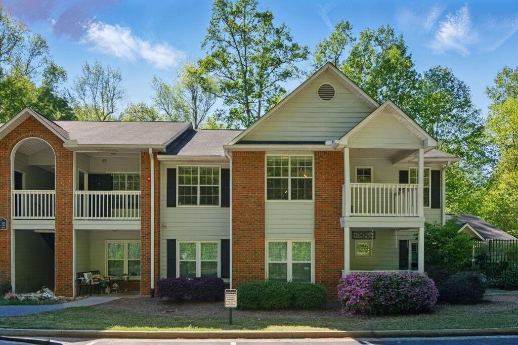 Top floor two-bedroom condo in the beautifully maintained gated community of Hembree Creek. This spacious condo features two large bedrooms, each with their own walk-in closets and full baths. The kitchen has been updated with stainless appliances including a GE profile dual-fuel range, counter-depth refrigerator, Bosch dishwasher, over-the-range microwave, single bowl sink, granite counter tops, tile back splash, and under cabinet lighting. The furnace and AC were replaced two years ago. The spacious family room features a fireplace and is open to a diningroom/flex space. The home also has low-maintenance LVP flooring, a walk-in laundry room, and covered balcony. Hembree Creek is conveniently located just minutes from downtown Roswell and Alpharetta. It provides easy access to GA 400, shopping, dining, and parks. Low monthly HOA fees cover the security gate, all exterior maintenance, trash, water, sewer, and pest control. This is a hidden gem that you must see to appreciate all it has to offer!