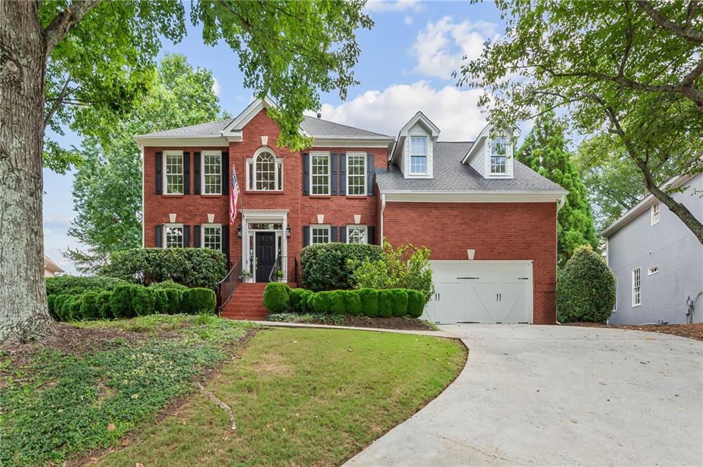 Nestled in a prime Alpharetta location just minutes from Avalon and walkable to local parks and greenways, this beautifully maintained five-bedroom, four-and-a-half-bath home offers the perfect blend of space, style, and convenience. The main level features a light-filled open-concept layout with an updated kitchen overlooking the family room and sunroom. A formal living room—ideal as a home office—and a separate dining room provide flexible living spaces, while the eat-in kitchen opens to a deck spanning the full width of the home, perfect for entertaining or relaxing with access to the professionally landscaped, fenced backyard.
Front and back staircases lead to the spacious primary suite featuring a spa-inspired renovated bath, while three additional bedrooms and two more renovated full baths offer plenty of room for family and guests. Along with the four bedrooms, a large second-floor bonus room provides additional living space that can be enjoyed by family and friends. The custom-finished terrace level adds even more living space with a media area featuring a built-in 11-channel surround speaker system, gym, bedroom, full bath with pebble-stone shower floor, finished workshop, and ample storage.
Located in a highly sought-after swim/tennis community and zoned for top-rated Alpharetta schools, with easy access to GA-400 and vibrant downtown Alpharetta, this home checks every box for comfort, lifestyle, and location.
