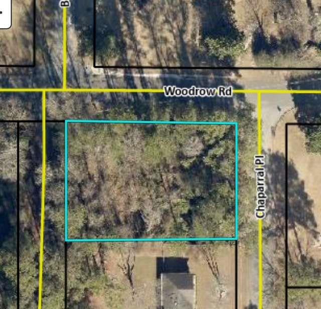 Don't miss this rare opportunity to own a spacious corner lot in a well-established area. This parcel offers the perfect setting for your dream home. Enjoy mature trees, paved roads and easy access to utilities. All information deemed reliable but should be confirmed by buyers during due diligence.