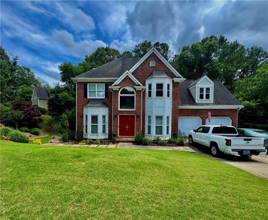 This home is a rare gem in one of Woodstock’s most desirable neighborhoods! Perfectly situated in the beautiful Eagle Watch community, 703 Overlook Point offers stunning, professionally landscaped grounds that create a private, peaceful retreat right outside your door. Inside, you’ll find an inviting open floor plan featuring a spacious living room with a cozy fireplace, an updated kitchen with granite countertops and stainless steel appliances, and hardwood floors throughout the main level.
The master suite boasts a luxury bathroom with dual vanities and a soaking tub, while additional bedrooms offer plenty of space for family or guests. The finished basement adds versatile living space — perfect for a media room, home gym, or office.
Location is everything — just minutes from premier shopping destinations like The Outlet Shoppes at Atlanta, popular malls, and an abundance of dining and entertainment options. Plus, quick access to I-575 means your commute is a breeze!
Homes like this, combining beauty, modern upgrades, and unbeatable convenience, don’t come on the market often. Don’t miss your chance to own this exceptional property — schedule your showing today before it’s gone!