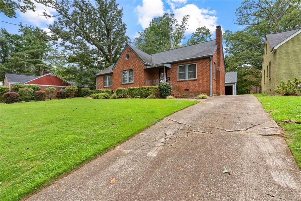 Welcome to your next home in the heart of Hapeville! This charming three-bedroom, two-bath four-sided brick beauty is full of personality and move-in potential. From the moment you step inside, you'll fall in love with its unique character, gorgeous tile work flows throughout the bathrooms, kitchen, and beyond, giving each space a touch of style you won't find just anywhere. The light-filled kitchen offers plenty of space for cooking and gathering, while the cozy living areas invite you to relax and make yourself at home. Situated in a convenient location near downtown Hapeville, Hartsfield-Jackson International Airport, parks, and local dining, this home is perfect for anyone looking to enjoy the best of small-town charm with quick access to the city. Sold as-is, it's ready for you to bring your vision and make it truly yours. Homes with this much character don't last long, come see it today!