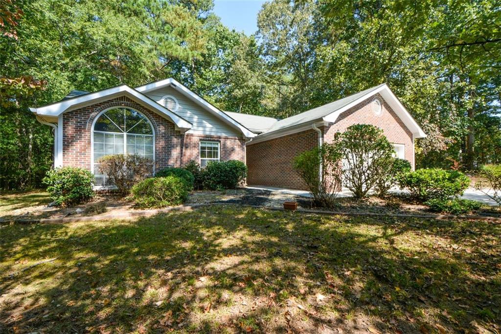 Welcome to this beautifully updated 3BR/2BA ranch on a spacious .79 acre lot in Fairfield Plantation, one of West Georgia's premier gated golf and lake communities. Featuring vaulted ceilings, a cozy fireplace, new flooring, fresh paint, and updated appliances, this home is truly move-in ready. The spacious primary suite offers a private bath, while generous bedrooms provide comfort for all. Enjoy resort-style amenities including golf, pools, tennis, trails, marina, sandy beach, and dining.