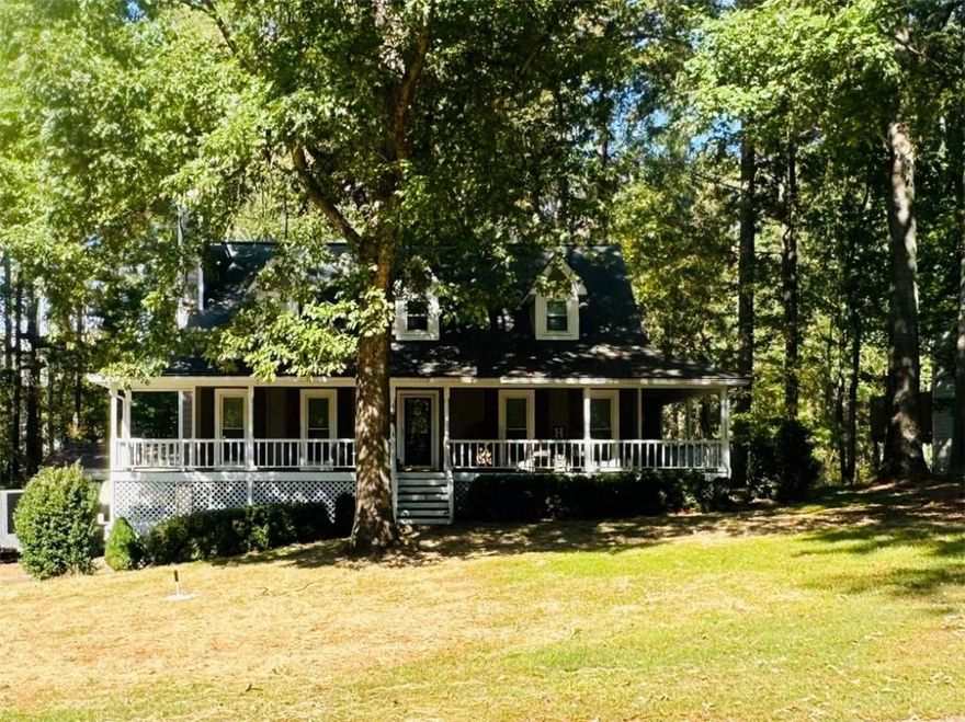 Nestled in a peaceful, well-established neighborhood, this beautiful home has so much to offer. Enjoy relaxing on the large covered front porch that wraps around to the side, perfect for morning coffee or evening gatherings. Inside, hardwood floors flow throughout the main level, accented by elegant crown molding and a cozy wood-burning fireplace. The kitchen features stainless steel appliances, granite countertops, and plenty of workspace.
The primary suite on the main level offers LVP flooring, a spacious bath with double vanity, tile floors, a separate soaking tub and large walk-in shower. Upstairs are two oversized bedrooms and a full bathroom, offering plenty of space for family or guests. The finished portion of the basement includes its own heating and cooling system and a bar area—ideal for entertaining or additional living space.
Outside, you’ll find a recently upgraded back porch overlooking a fenced backyard, with the property line extending into the private wooded area beyond. A 36x30 insulated shop with heating, cooling, and epoxy floors provides endless opportunities for work or hobbies. Additional highlights include all HVAC systems less than six years old and a newly upgraded seven-chamber septic tank.
This home perfectly blends charm, functionality, and potential—ready to welcome its next owner. **Professional photos will be added 10/21/25**