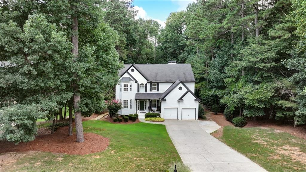 Beautifully updated home on 1 plus acre lot in sought after Sable Pointe. Enjoy rare opportunity for Milton/Milton schools with finished basement and great neighborhood amenities for under 1M!
The main level features entry foyer, living room, dining room, powder room, open kitchen, great room, 9’ ceilings, wood floors, plantation shutters, crown molding, gas fire place, and walk out to back deck with views of large fenced backyard.
The kitchen renovation includes granite counters, stainless steel appliances, gas range, tile backsplash, farm sink, stained cabinetry, wine refrigerator, microwave, vent hood, large pantry, and peninsula with bar seating.
Upstairs you find large primary bedroom with separate sitting room/secondary den, primary bathroom with glass enclosed tile shower, soaking tub, granite double vanity, large walk in closet with built in shelving, laundry room, linen closet, 3 large guest bedrooms, renovated guest bathroom, and upgraded wood floors.
The finished daylight basement includes added cabinetry/counter space, additional guest bedroom, full bathroom, large den/recreation room, gym space, additional unfinished storage areas, upgraded wood floors, and walk out access to covered/dry-deck lower level deck and backyard.
Additional highlights are cul-de-sac street, large/wide driveway, brick/hardie board construction, thermal pane windows, extra deep garage space, landscaped/private front and backyard, outbuilding for storage, and large neighborhood pool with ample decking/seating area within a couple minute walk from the home.
Enjoy easy access to Milton, Dowtown Alpharetta, top schools, shopping, parks, GA400, and more.