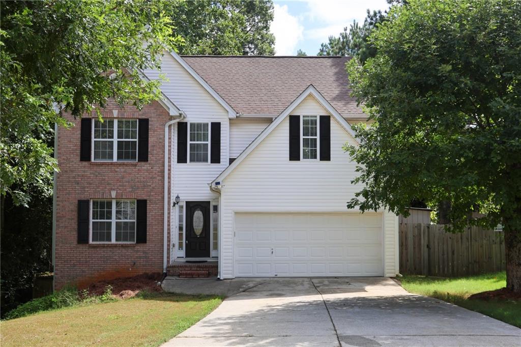Welcome to your perfect Lawrenceville retreat! This stunning 4-bedroom, 4-bath home sits proudly on a quiet cul-de-sac in the highly desirable Lexington Park swim and tennis community. From its charming brick front and low-maintenance washable siding to its spacious, light-filled layout, every detail is designed for comfort and style. The star of the home is the fully finished in-law suite basement—complete with a private entrance, bedroom, bath, living area, and kitchen—ideal for guests, extended family, or even rental income. Recent upgrades include a brand-new back patio door opening to a very spacious, fully fenced backyard, perfect for outdoor gatherings, pets, or simply enjoying the Georgia sunshine. Best of all, you’re within walking distance to all community amenities, including the pool, tennis courts, and clubhouse. This home offers the perfect blend of privacy, convenience, and charm—just minutes from vibrant downtown Lawrenceville. Photo Disclosure: All images are natural and unaltered—no filters, enhancements, or digital alterations are used. What you see is what you get; the photos reflect the property exactly as it appears in person.