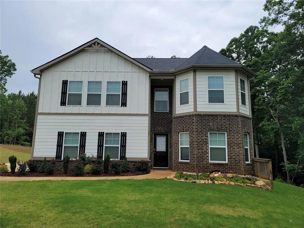 Welcome to 25 Miller Lake Court in Covington! This beautifully maintained 5-bedroom, 3-bathroom home sits on a peaceful 1-acre lot and offers over 2,400 square feet of modern living space. Built in 2021, the home features a stylish kitchen with granite countertops, stainless steel appliances, and a large walk-in pantry that opens up to the spacious family room, perfect for everyday living and entertaining.
The main level includes a private in-law suite with a full bath, while upstairs you'll find a generously sized owner's suite complete with two walk-in closets and a spa-like bathroom. You’ll also enjoy a 2-car garage and plenty of outdoor space to relax or host gatherings.
This one has it all- style, space, and comfort. Showings are available starting June 9.