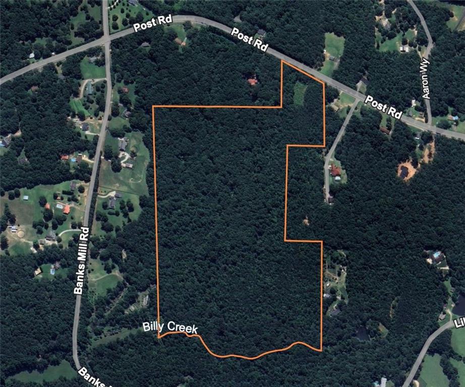 Welcome to 6035 Post Road in Douglasville, GA—an extraordinary ±57-acre estate property offering the perfect balance of privacy, natural beauty, and convenience. Tucked away in a serene setting, this expansive tract of land presents a rare opportunity to design and build a one-of-a-kind luxury residence or family retreat surrounded by rolling terrain, mature woodlands, and sweeping vistas. Imagine creating a custom estate with private drives, equestrian facilities, gardens, or even a resort-style pool and outdoor living spaces—all within your own secluded sanctuary. Despite its tranquil atmosphere, the property is just minutes from Douglasville’s vibrant shopping, dining, and entertainment, and offers easy access to Atlanta for world-class culture, dining, and travel. Outdoor enthusiasts will love the proximity to Sweetwater Creek State Park, Boundary Waters Recreational Complex, and Foxhall Resort, while Arbor Place Mall and the charm of downtown Douglasville provide endless conveniences nearby. Rarely does a property of this scale and setting become available so close to the city—making it the ideal canvas for an uncompromising estate vision.