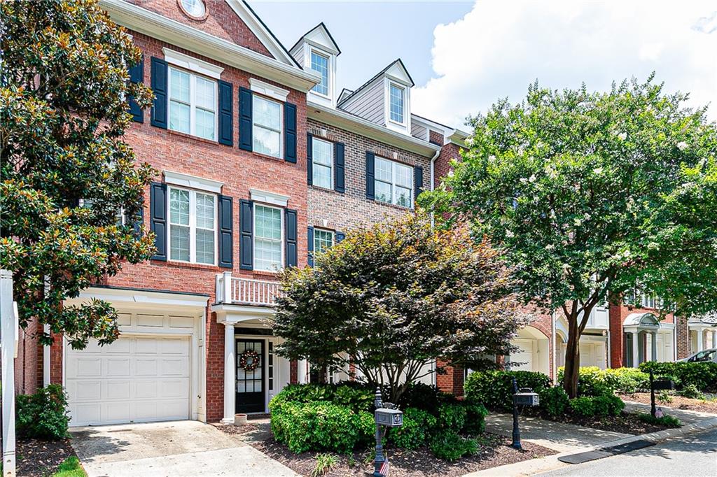 Welcome to The Heritage at Roswell, where comfort, convenience, and community come together in one of the area’s most desirable neighborhoods. This move-in ready 3-story townhome has been meticulously maintained with no detail overlooked. Step inside from the charming front entry or directly from the garage into the spacious terrace level, which features a large bonus room—ideal as a home office, guest suite, man cave, teen retreat, or whatever suits your lifestyle—plus a full bathroom and abundant storage. Like-new carpet leads you upstairs to the bright and open main level, where a gas fireplace anchors the elegant great room. Flanked by custom built-ins, there’s plenty of space to showcase your treasures or neatly tuck things away. A stylish powder room sits just off to the side, which flows into a cozy reading nook or formal dining space—your choice! The heart of the home is the expansive kitchen, thoughtfully designed with granite countertops, stainless steel appliances, ample cabinetry, and a sunlit eat-in area. Just off the kitchen, enjoy your morning coffee in the inviting sunroom or on the private deck, perfect for relaxing or entertaining. The upper level is a true retreat. The luxurious primary suite features a spacious sitting area, an oversized walk-in closet with custom built-ins, and a spa-like ensuite with double vanities, a soaking tub, glass-enclosed shower, and private water closet. The secondary bedroom also includes a private ensuite and closet built-ins, ensuring comfort and privacy for all. Conveniently located on this level, the laundry room adds to the home’s practical layout. All this, nestled within a beautifully maintained community offering exceptional amenities—clubhouse, fitness center, swimming pool, lap pool, tennis courts, walking trails, and a serene pond. Ideally situated near downtown Roswell, and the vibrant energy of Canton Street, you’ll enjoy easy access to parks, live music, shopping, and local favorites like Table & Main, 1920 Tavern, and Silla del Toro—just to name a few. Plus, you're minutes from the Chattahoochee River National Recreation Area and only 8 minutes from GA-400. This home truly offers the best of Roswell living—don’t miss it!