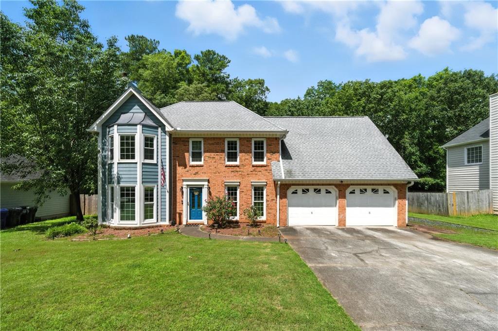 This is the home you have been wishing for! Welcome to this beautifully maintained 4-bedroom, 2.5-bath traditional home located in the highly desirable Tammeron Trace neighborhood. Situated on a rare flat front and back yard, this property offers the perfect blend of comfort, convenience, and value. Step inside to discover a light-filled layout featuring an updated kitchen with white shaker cabinets, stainless steel appliances, and plenty of storage. The home is truly move-in ready with several recent updates including a newer roof, furnace, washer/dryer, and more! The spacious, fully fenced backyard is ideal for outdoor living and entertaining, and now includes a newly built gravel pad—perfect for a fire pit, extra parking, or storage. Located near the neighborhood pool, this home offers unbeatable convenience. The zoned elementary school is less than a mile away, making school runs a breeze. Don't miss this opportunity to own a turn-key home in one of West Cobb’s most desirable communities!