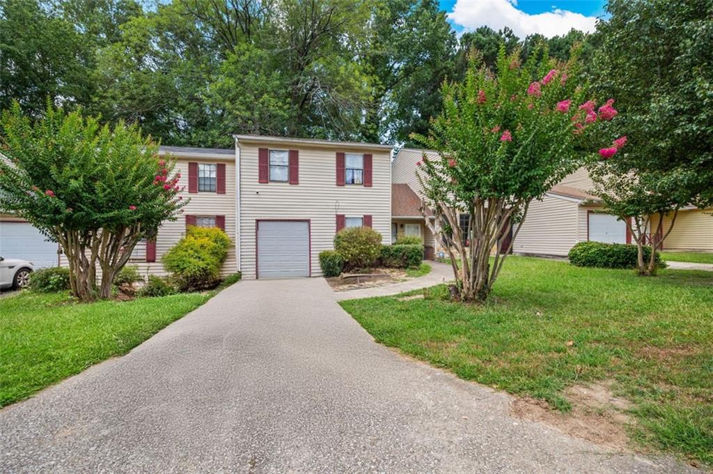 Welcome to 1006 Pine Tree Trail! This 4 bedroom, 2 bathroom condo is perfect for owner-occupants and investors alike. There are no rental restrictions in this community. This home features an open floorplan, spacious bedrooms, a garage, and plenty of storage space. It is very close to Atlanta Hartsfield-Jackson airport, shopping, parks, and public transportation.