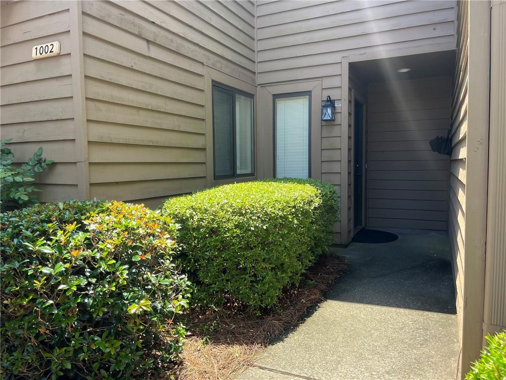 Located in a sought-after East Cobb community, this light-filled 2-bedroom, 2.5-bath condo townhome is zoned for top-rated schools (Sope Creek ES, Dickerson MS, and Walton HS). The main level features a bright and airy living room with a cozy fireplace and vaulted ceilings. The updated kitchen shines with stone countertops, modern cabinetry, new faucet and new appliances. There's a walk in pantry. A flexible space on the main floor can be used as a formal dining room, home office, or play area—whatever fits your lifestyle. Step outside to a private, fenced-in patio and yard —perfect for morning coffee or winding down. Unbeatable location with quick access to GA-400, and I-285. Just minutes from The Avenue East Cobb, Merchants Walk, Paper Mill Village and Trader Joe's. Endless options for shopping, dining, and entertainment. Outdoor lovers will appreciate nearby parks, trails, and the Chattahoochee River to go kayak, walk or tubing. HOA, water and trash are included with your rent. Apps are at https://apply.link/0m3MkSA