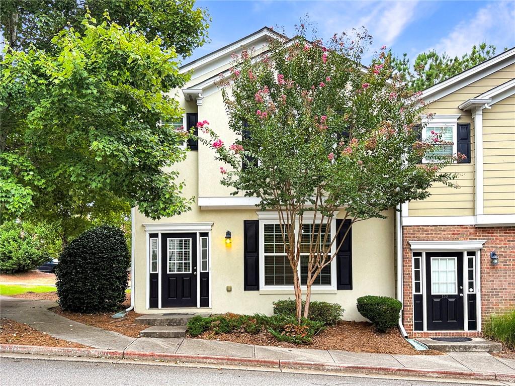 Ready for a change? This move-in ready, end unit town home is ready for you! The open concept floor plan townhome has FRESH neutral PAINT including trim and ceiling, NEW LVP flooring, NEW carpet, and NEW HVAC. The spacious great room has built-in bookshelves. The kitchen features white cabinets, gas range, pantry, and leads to the patio. Large Owner's Suite with walk-in closet. Owner's bath has NEW LVP and a huge vanity for storage. Two additional bedrooms are located in the rear of the home with for privacy. One car garage with rear entry. Additional reserved parking space available for $25 per mo. HOA covers exterior maintenance, including roof, lawncare and community pool. Unbeatable location close to interstate, shopping, dining, schools, and downtown Canton.