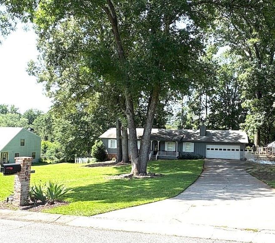 PRICE REDUCTION!!!  This three-bedroom, two-bathroom ranch-style home is situated on approximately half an acre. It boasts a spacious, modern open floor plan that is exempt from Homeowners Association (HOA) regulations. Additionally, it is conveniently located near dining establishments, shopping centers, and highly regarded educational institutions.

The kitchen is modern and open, featuring a breakfast bar, white cabinets, and stainless steel appliances. It’s a chef’s dream! The great room, with its vaulted ceilings, features a cozy fireplace perfect for chilly evenings. The dining room with a French door leads to a level fenced backyard with a new, completely refurbished back deck, perfect for relaxation and outdoor activities. The primary suite is equipped with his-and-hers closets with an ensuite bathroom. Furthermore, there is a two-car garage with an exceptionally long driveway, ensuring ample parking space for guests. The interior home has been recently painted with designer colors, The front porch has been freshly painted, making it ready for immediate occupancy. The lot is spacious enough to accommodate future expansion.

Real estate in this area sells rapidly, so seize this opportunity to make this home yours.