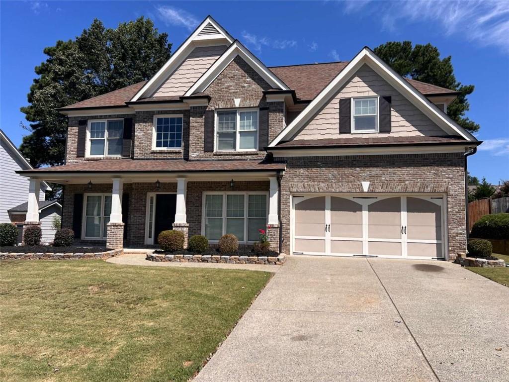 This home has it all! Bright open 2 story foyer and family room open to gorgeous kitchen w/island and walk in pantry. Guest bedroom and full bathroom on main floor, formal living and dining room w/ beautiful crown molding and extensive trim! Continue your living outdoors with a large covered patio wired for tv and 2 fans to use virtually year round! Relax outdoors in the large fenced in, private back yard with a massive shed/workshop for storage and/or workspace! Move right into this immaculate home which features a newer roof, water heater and ac units!