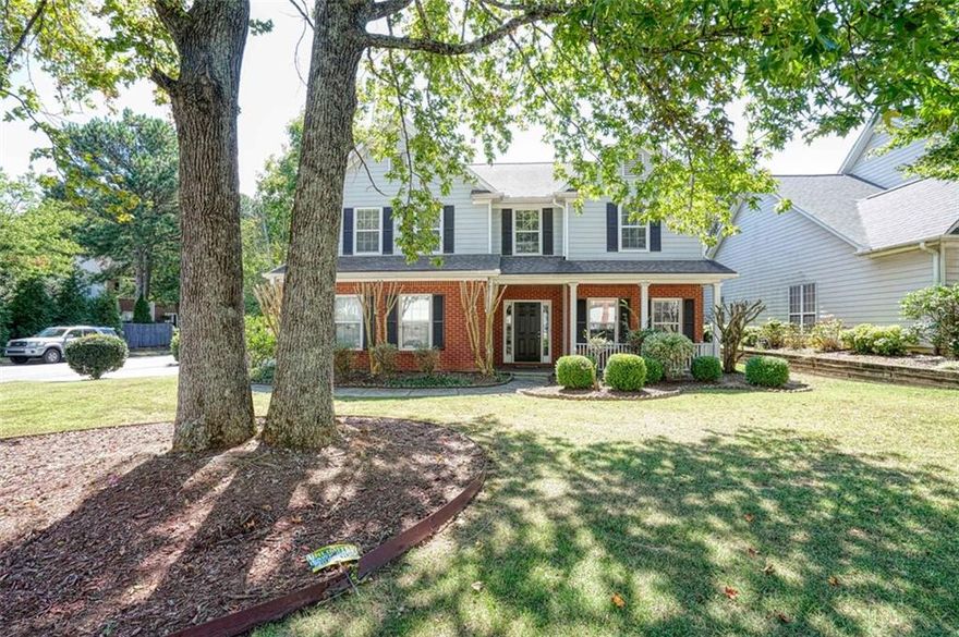 This stunning brick-front home boasts elegance and space. It features 4 spacious bedrooms and 2.5 bathrooms, all situated on a desirable corner lot in the highly sought-after Chattahoochee High School district.
As you approach the house, you’re greeted by a charming Southern-style front porch and beautifully landscaped lawn. Upon entering, you'll find a large living room with tiled flooring that flows seamlessly into the family room, which features a cozy built-in fireplace. The family room overlooks a generous kitchen, perfect for entertaining.
Step outside to the patio in the fenced backyard, which is ideal for outdoor gatherings or relaxing in privacy. This home is a perfect blend of comfort and style!
Upstairs, you’ll find all four bedrooms, including a spacious master suite with a large ensuite bathroom. The master bath features modern fixtures, dual vanities, and a relaxing soaking tub. The additional bedrooms are well-sized and perfect for family or guests, offering plenty of natural light and closet space. This layout ensures both comfort and convenience for everyone in the home!
