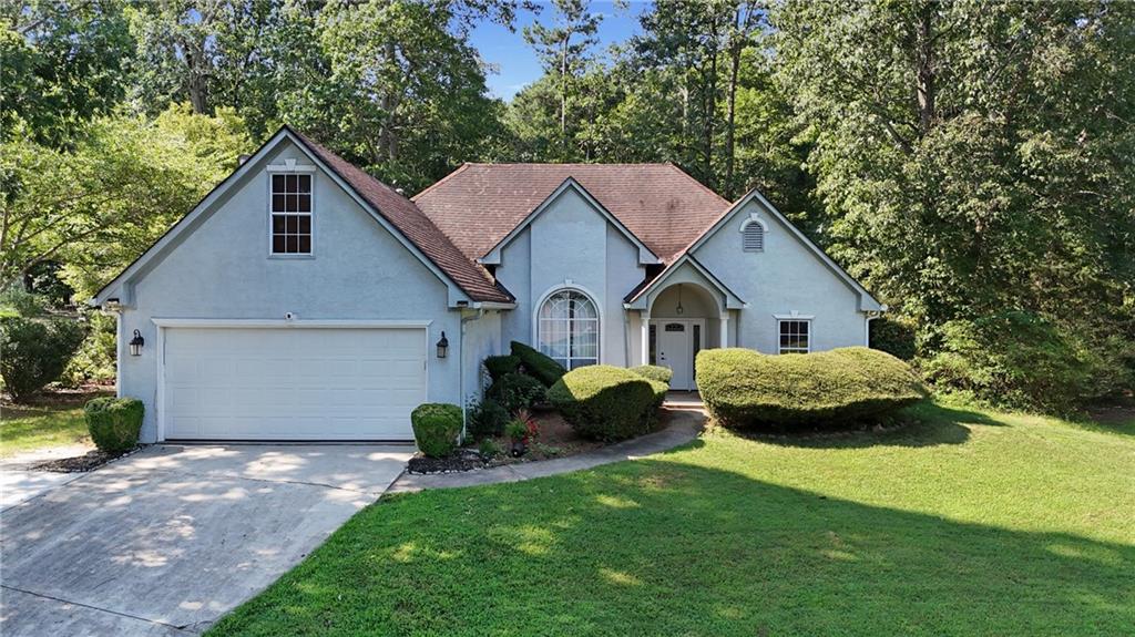 Welcome to this beautifully maintained 3-bedroom, 2-bathroom home with a cozy bonus living area, nestled in the sought-after community of Lake Spivey, it won't last long! This residence effortlessly blends timeless charm with modern sophistication, offering a lifestyle of comfort and convenience.
As you step inside, you are greeted by expansive, light-filled living areas highlighted by beautiful flooring and soaring ceilings that create a warm and inviting atmosphere. The spacious layout is designed for effortless living, with an open-concept flow from the huge family room to the formal dining room - the heart of the home and a fully updated modern kitchen featuring sleek countertops, stainless steel appliances, beautiful soft-close cabinetry with under cabinets lights and crown molding, and a breakfast area perfect for casual dining or entertaining.
The spacious primary suite is conveniently located on the main level, offering a serene retreat boasting a tray ceiling which makes the room feel even larger, a walk-in closet, and a beautifully renovated en-suite bathroom with a soaking tub, separate shower, and double vanity. Two additional bedrooms one on the main and one upstairs provide plenty of space for family or guests, while the versatile main bonus room serves as an ideal living room, fourth bedroom, home office, playroom, or flex space, adaptable to your lifestyle needs.
With ample closet space and abundant storage throughout, a generous laundry room, and 2-car garage, ensuring organization is effortless and practicality is met with ease. The large outdoor space features a private backyard oasis and patio perfect for gardening, relaxing, hosting gatherings or a quiet morning cup of coffee under the stars.
Located in the well-maintained and quiet Lake Spivey Glen community, this home is surrounded by peaceful tree-lined streets and friendly neighbors. Just minutes from Lake Spivey Park and Reeves Creek Trail, outdoor recreation is always close at hand. The home is also conveniently near Spivey Splash Water Park, shopping centers, local eateries, and top-rated schools, with easy access to I-75, making your commute to downtown Atlanta smooth and stress-free.
This is more than just a home — it’s a lifestyle of comfort, space, and modern elegance in one of Henry County’s most desirable neighborhoods.