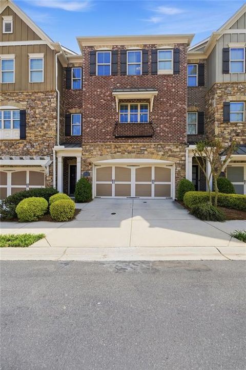Photo of 917 Dumaine Trace, Atlanta, GA 30328 (MLS # 7746643)
