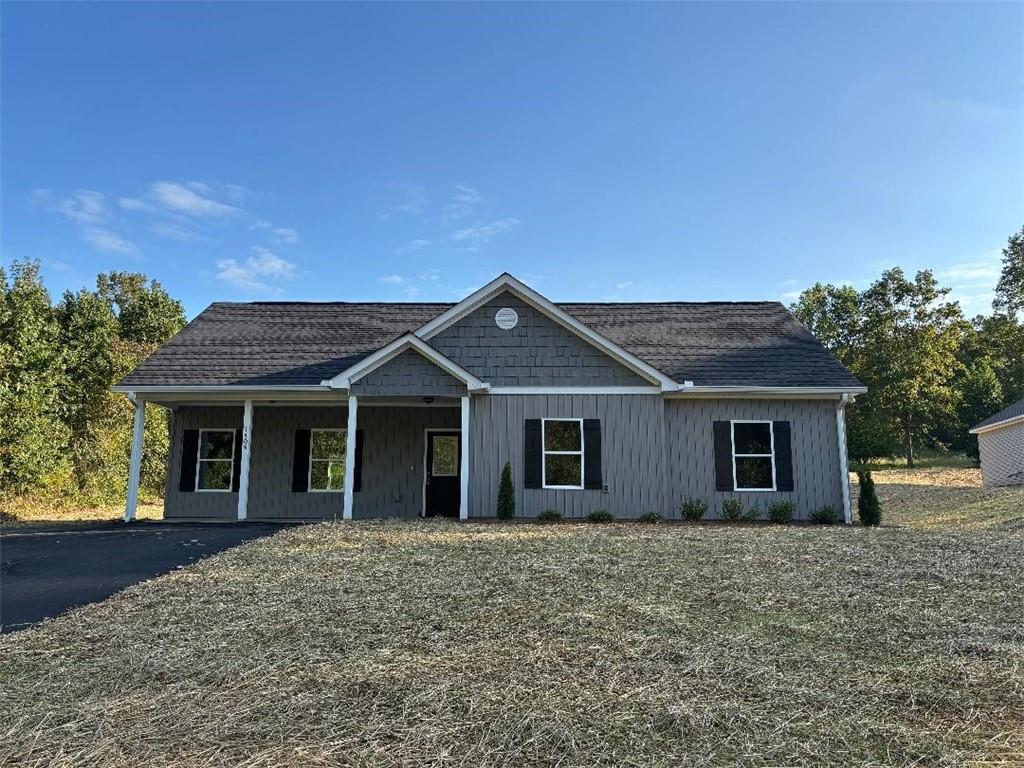QUALITY NEW CONSTRUCTION ON THIS STEP LESS 3/2 VINYL RANCH ON 1 ACRE LOT JUST MINUTES FROM GA. 400, DAHLONEGA, MURRAYVILLE, CLEVELAND AND GAINESVILLE. SPACIOUS KITCHEN WITH OVERSIZED GRANITE ISLAND WITH VIEW TO VAULTED GREAT ROOM PERFECT FOR ENJOYING YOUR FAMILY OR ENTERTAINING, SOFT CLOSE WHITE CABINETS AND GE STAINLESS APPLIANCES INCLUDING SIDE BY SIDE REFRIGERATOR, FARMHOUSE SINK, PANTRY. QUALITY LUXURY VINYL THRU OUT FOR EASY MAINTENANCE, BRIGHT, LIGHT AND AIRY. MASTER HAS TREY CEILING, WALK IN CLOSET AND DOUBLE VANITY. TOTAL ELECTRIC, $45 PER MONTH FOR PRIVATE WATER, TERMITE BOND AND BUILDER"S WARRANTY, NO RENT RESTRICTIONS.
PROPERTY WAS SUBDIVIDED THIS YEAR AND TAXES TO BE DETERMINED BY LUMPKIN COUNTY TAX COMMISSIONER'S OFFICE