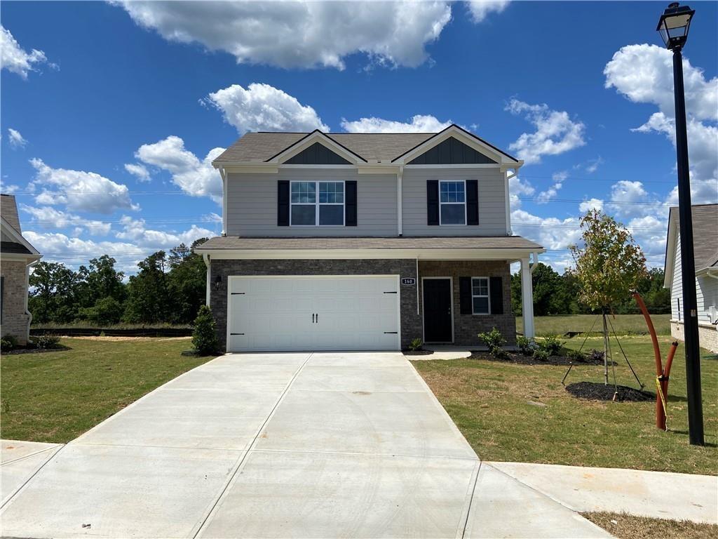 Come see this gorgeous four-bedroom, two-and-a-half-bath home. A welcoming covered front porch and spacious garage welcome you to this modern property. Inside, discover a chef-ready kitchen boasting granite countertops, 36” upper-wood cabinets, an island, and a view to the family room, perfect for modern living. The open-concept dining area enhances the spacious feel.
Upstairs, find four generously sized bedrooms, including an expansive master retreat. This private sanctuary features a full bathroom with a separate shower, soaking tub, and a massive walk-in closet. With quality flooring, central air and heating, and a two-car garage, this home offers comfort and convenience in a fantastic location.