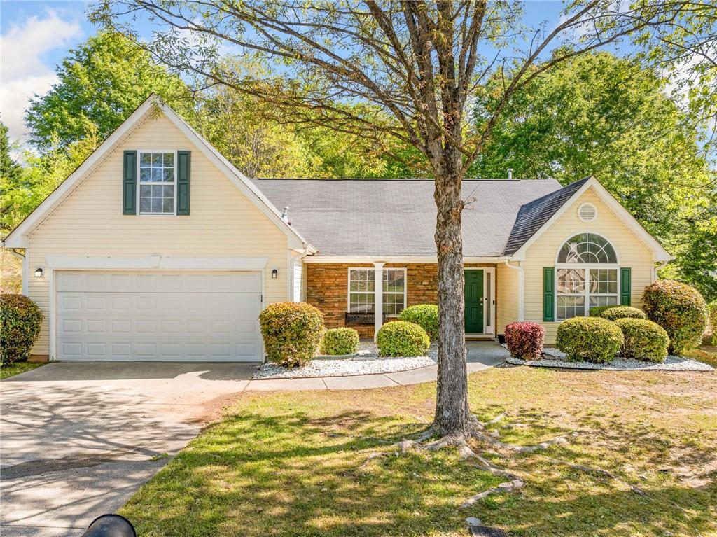 Loganville Ranch home with 4 spacious bedrooms (including bonus bedroom) and 2 full baths. Separate living room/flex room, separate dining room and a great family room with fireplace. Kitchen with granite counter, glass stone backsplash and breakfast area. Master suite on main with walk in closet, separate shower, garden tub and double vanity. Split bedroom plan. Laundry room/ mud room. Backyard is private, fenced, patio and garden area. 2 car garage. Community has swimming and tennis. Within minutes to shopping, eateries, and schools. Surrounding not far is Stone Mountain Park, Stone Crest Mall. Sellers are very motivated..