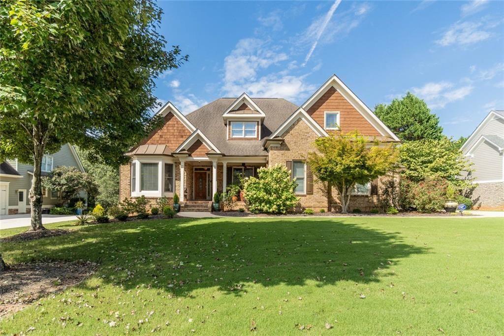 Pictures don't capture the full beauty of this home! It is one that you MUST SEE in person!! Schedule an appointment today!!
Discover this exquisite executive-style custom-built home situated in a lively swim, tennis, and lake community. This remarkable property is part of a neighborhood celebrated for its esteemed schools and year-round family-friendly events, perfectly blending luxury with community living. Featuring a three-car garage and an eye-catching three-sided brick exterior adorned with charming cedar shaker accents, this home offers impressive curb appeal. The established landscaping, enhanced by a convenient irrigation system, ensures year-round beauty with minimal upkeep. Upon entering, you'll find a private office ideal for remote work and a spacious formal dining room. The heart of the home is the expansive great room, complete with a cozy fireplace that creates a warm atmosphere. The eat-in kitchen showcases solid wood cabinetry, a gas cooktop, double oven, and coffee bar, all highlighted by stunning granite countertops. A bright adjoining keeping room leads to a large deck that overlooks a private backyard, perfect for serene outdoor dining while easily serving from the kitchen. The main floor is adorned with gleaming hardwood floors that are flooded with natural light, adding warmth and elegance to every space. The luxurious primary suite on the main level serves as a tranquil retreat, featuring a spa-like bathroom with a jetted tub, spacious walk-in shower, and a generously sized closet for ample storage. Upstairs, you’ll find three roomy bedrooms, one of which doubles as a bonus room, and two additional full bathrooms, providing plenty of space for the whole family. The unfinished terrace level presents endless possibilities for customization, whether you envision an in-law suite, guest quarters, or the ultimate entertainment space. This area has the potential for a full bathroom, bedroom, media room, and more! With abundant attic and basement storage, you’ll have plenty of room for keepsakes and seasonal décor. Step outside to your private, park-like backyard, where the soothing sounds of nature and picturesque seasonal views await. This meticulously maintained lawn offers an ideal setting for outdoor living and enjoyment. Conveniently located near major highways for easy commuting, as well as a variety of shopping and dining options, you'll also enjoy nearby parks, walking trails, and recreational facilities, providing endless fun and local events. This dream home truly embodies a perfect blend of luxury and functionality for a personalized lifestyle.