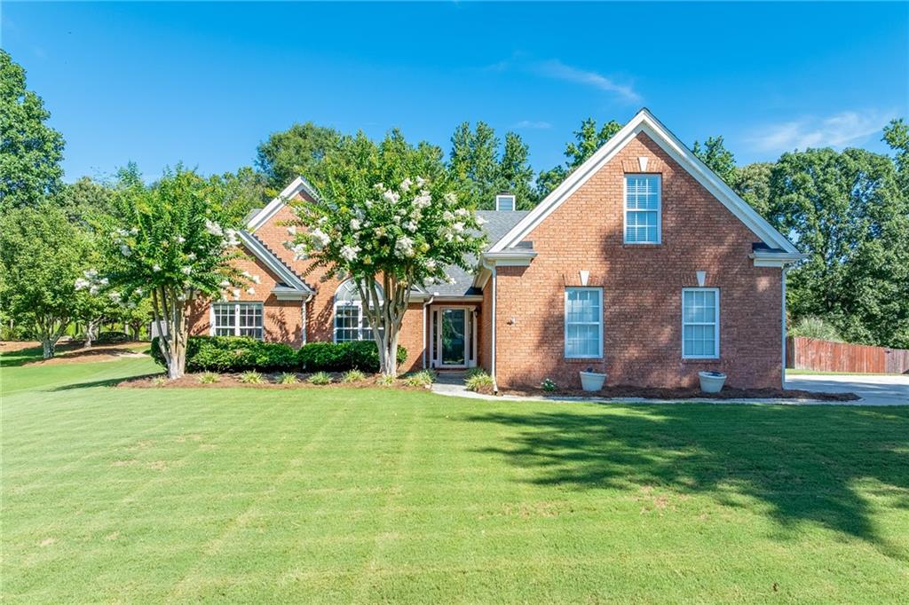 Welcome to this beautifully maintained 4 bedroom, 2.5 bath brick-front ranch situated on a spacious, level lot in a quiet Dacula neighborhood. Located just one mile from Harbins Elementary, only 5 minutes from scenic Harbins Park, and close to Hwy 316 for easy commuting, this home offers both comfort and convenience.
Step inside to discover a well-designed floor plan featuring a large kitchen with granite countertops, a center island, and ample cabinet space — perfect for cooking and entertaining. Enjoy meals in the separate dining room, or relax in the sunroom filled with natural light.
The master suite is conveniently located on the main level, offering privacy and comfort. Two additional bedrooms are also on the main floor, while the spacious upstairs bonus room—with closet—can serve as a 4th bedroom, home office, or playroom.
Outside, you'll find a fenced backyard ideal for kids, pets, or outdoor gatherings. A 3-car garage and level driveway provide plenty of parking and easy access.
This home has it all — space, style, and a great location. Don’t miss the opportunity to make it yours!