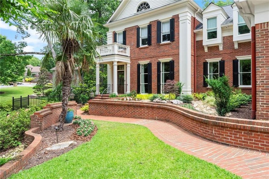 Exceptional home in Atlanta Country Club on a quiet cul-de-sac is enhanced with refined architectural details such as window transoms, privacy alcoves, high profile molding, stair landings and much more. The professionally designed and renovated residence offers a cohesive and timeless transitional style throughout making it turnkey ready.  

Upon entry, a two-story foyer will greet you with a truly elegant staircase and dramatic windows. A formal living room is adjacent to the entryway. A spacious but warm family room with coffered ceilings opens seamlessly to a sophisticated kitchen with marble countertops, Sub-Zero refrigerator, Thermador gas range, KitchenAid appliances, warming drawer, prep sink and banquet seating. A butler’s pantry with wine fridge and glass cabinetry adds elegance while connecting the kitchen and dining room which easily accommodates 12 guests. 

The main level also offers a chic powder room with alcove entrance as well as a full bath with hidden shower, two large storage closets, and an expansive laundry room with built-ins and a desk area. A portico covered private back entry leads into an access hallway with a mudroom and connects to the main laundry room.  

Upstairs the newly expanded Primary Suite is entered through a private sitting room with a fireplace. The oversized bedroom showcases a wall of windows with a stunning view of the pool and a fireplace. A true dressing room houses four custom, built-in armoires. The suite features His & Her walk-in closets.  The fresh, all white primary bath includes a steam shower, heated floors, dual vanities, water closet and heated towel rack. 

Additionally, two more bedrooms with walk in closets are connected by a true Jack and Jill bath. A third secondary bedroom has an ensuite bath with a walk-in closet. A fourth “suite style” bedroom is accessed by a private staircase, ensuite bath and walk in closet. This large suite would be ideal for a nanny, guest or other.  A secondary laundry room is located upstairs for convenience. 

A sixth bedroom with ensuite bath is on the lower level. The fully finished basement opens to a sunny spacious living area with a fireplace and leads to a fully equipped kitchen with double ovens, dishwasher, refrigerator and granite bar. Additionally there is a soundproof media room, weight room with sauna and a powder room.

Enjoy year-round outdoor living on the covered porch featuring new Eze-Breeze windows, infrared heaters, and a cozy fireplace. The walk-out terrace level showcases an infinity-edge pool, brand-new paver pool deck (2024), hot tub with waterfall, outdoor kitchen with grill, sink, refrigerator, granite counters, bar seating, and a freestanding fireplace—plus ample yard space beyond. Three-car garage with epoxy flooring. Ample parking in the driveway. This is luxury living at its finest in one of Atlanta’s most prestigious communities.