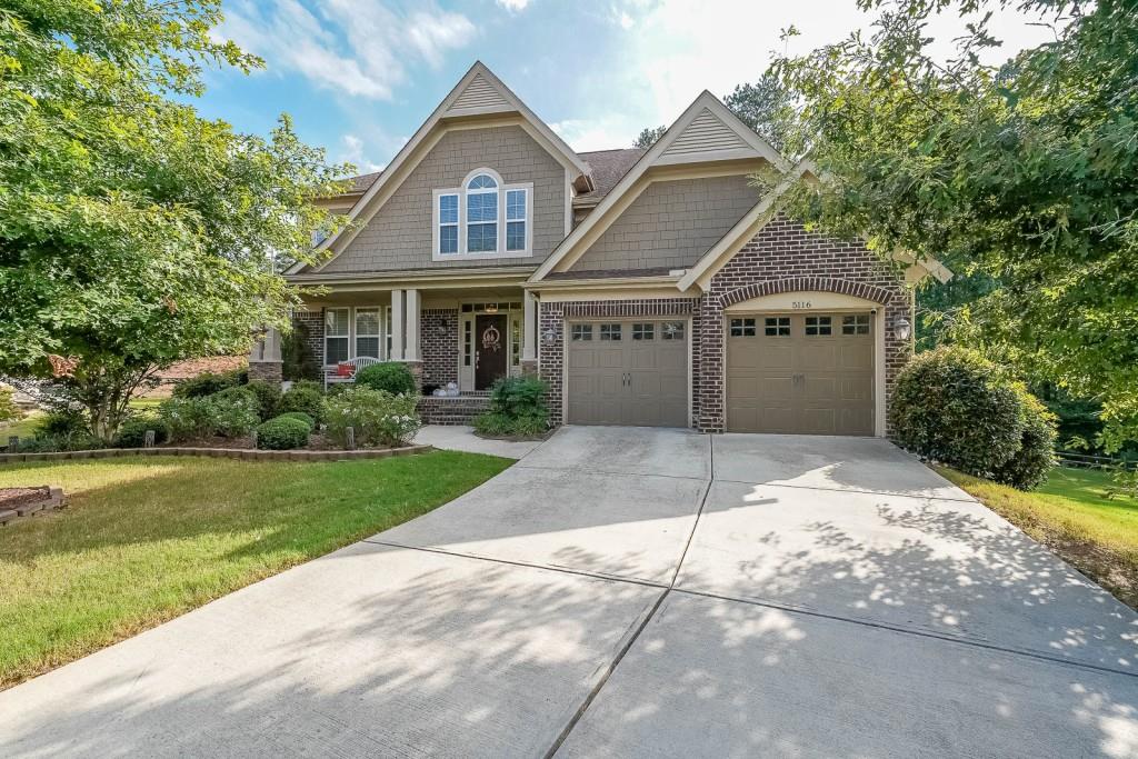 Luxury Meets Lifestyle in West Oaks! Welcome to 5116 Barton Pass, where upscale design, thoughtful upgrades, and a perfect Cobb County location come together beautifully. This 5-bedroom, 4.5-bath home is truly special impeccably maintained and loaded with custom details that make it feel like a model home. From the moment you walk in, you'll notice gleaming hardwood floors, and a two-story great room filled with natural light. The open-concept kitchen is a showstopper with granite countertops, tile backsplash, stainless appliances, a five-burner gas cooktop, tons of cabinetry! The luxurious primary suite is a true retreat with a sitting area, spa-inspired bath, and a fabulous walk-in closet with his-and-her sides. Upstairs, you'll find generous secondary bedrooms The finished terrace level with Kitchen/Bar and full bath is ideal for entertaining, media room or perfect in-law suite! Outside, enjoy your own backyard oasis with the perfect cup-de-sac lot perfect for football, pets, or playtime. Located on a quiet cul-de-sac in West Oaks Enclave, just minutes from Lake Allatoona, Allatoona Creek Park, trails, top-rated schools, shopping, and dining this home checks every box. Welcome Home!