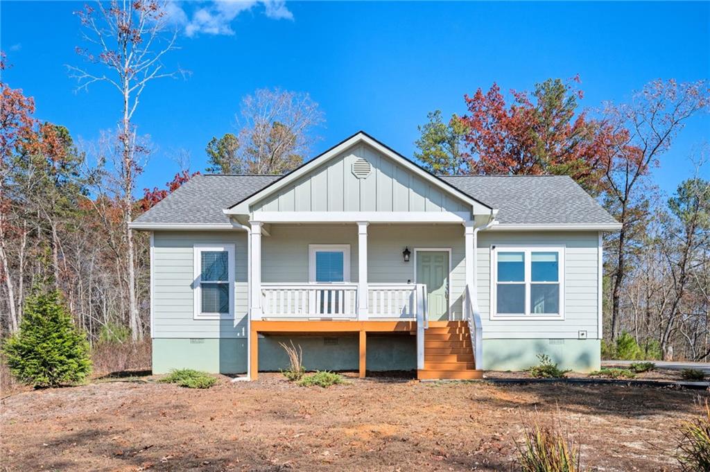 Nestled in the serene beauty of the North Georgia Mountains, this charming 3-bedroom, 2-bath ranch-style home offers the perfect mix of comfort, style, and tranquility. Step inside to an inviting open-concept layout with abundant natural light, creating a bright and airy atmosphere ideal for both everyday living and entertaining. The spacious living areas feature recessed lighting and newer carpeting, while the brand-new luxury vinyl plank flooring in high-traffic areas adds modern durability and low-maintenance ease. At the heart of the home, the updated kitchen flows seamlessly into the living room, making it easy to host gatherings or simply relax while enjoying mountain views through large windows. A dedicated laundry room adds convenience, and a brand-new HVAC system ensures year-round comfort—cool in the summer, cozy in the winter. Whether you're savoring quiet moments indoors or embracing the beauty of the surrounding outdoors, this home offers the best of mountain living. Don't miss your chance to own a peaceful retreat in one of North Georgia’s most desirable mountain communities.