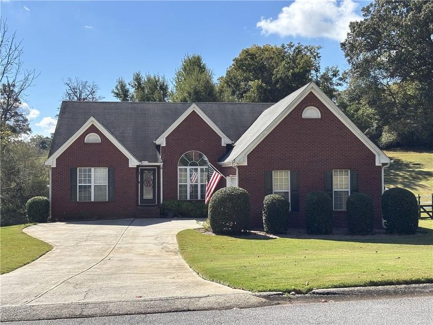 Updated ranch close to Lake Lanier, Ga 400 and great Forsyth County schools and tax breaks for Seniors. Friendly neighborhood with large fenced yard and full finished basement with custom bar, lighting, game room and kids arcade. This is a must see in this price range.