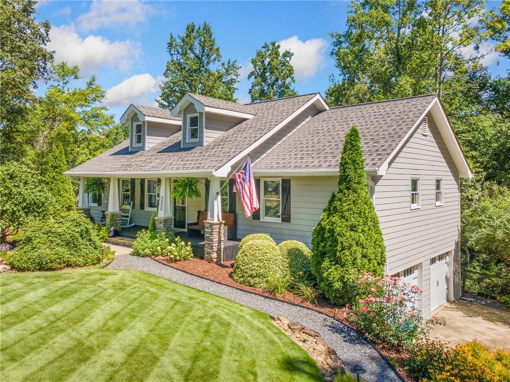 The Mini-Farm You've Been Waiting For!
Welcome to this charming ranch-style retreat nestled on 2.18 acres of professionally landscaped land. From the moment you arrive, the stunning landscaping sets the tone—meticulously maintained and truly magazine-worthy. Thoughtfully designed for both comfort and functionality, this mini-farm features a full sprinkler system, two lush gardens, fruit bushes, a chicken coop, and a beautiful fire-pit area—perfect for peaceful evenings outdoors.
Step inside to discover a comfortable and inviting flow, with the primary suite conveniently located on the main level. The home boasts beautifully updated bathrooms and a walk-in laundry room for added ease. The bright kitchen opens onto a brand-new back deck—ideal for morning coffee, weekend grilling, or entertaining guests.
The main level offers three bedrooms and two full updated bathrooms, while the finished basement includes an additional bedroom, full bathroom, and a flexible space perfect for a media room, home office, or secondary living area. You'll also enjoy access to the spacious two-car garage with plenty of storage.
Additional highlights include two outdoor storage sheds, a fenced-in side yard perfect for pets, and ample parking for guests. Located on a quiet and private drive, this home provides the peace of country living while being just 10 minutes from Highway 575—offering easy access to shopping, dining, and commuter routes.
Whether you're looking for a peaceful homestead, a hobby farm, or simply more space to breathe, this property has it all. Don't miss your chance—schedule a showing today!