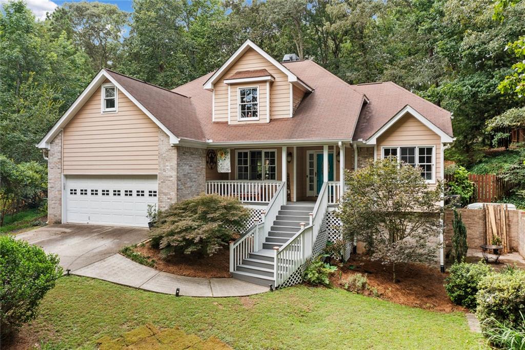 Rare Opportunity in Geneva Woods – South Forsyth High School District!
Tucked away on a quiet street in the coveted Geneva Woods community, this beautifully maintained home sits on nearly an acre of private, wooded property —a serene retreat with the convenience of Forsyth County living. Homes in this neighborhood seldom hit the market, and this one is truly exceptional.
With 4 spacious bedrooms, a bonus room upstairs, 2.5 bathrooms, and over 3,200 square feet, this home offers generous space, comfort, and flexibility for today’s lifestyle. The primary suite is ideally located on the main level, while the upper level features all-new hardwood flooring and bright, airy secondary bedrooms.
At the heart of the home, a light-filled two-story living room with a double-sided fireplace leads into a bright and open eat in kitchen. Step outside to the updated back deck with a brand-new wood pergola, and enjoy peaceful mornings or evenings in your fenced backyard oasis, complete with lush landscaping, gravel walkways, a fire pit with custom path, and blueberry, raspberry, and rose bushes.
Additional highlights include a laundry/mudroom conveniently located off the garage and a finished walk-out basement offering multiple flex spaces—ideal for a media room, home gym, playroom, or studio. With its own private exterior entrance, the basement offers excellent potential to add a full kitchen and bathroom, creating an independent living space or in-law suite.
Recent updates include: new hardwoods upstairs, new carpet in the basement, new upstairs furnace new refrigerator, paint, new gutter system, and enhanced landscaping and hardscaping.
Enjoy swim and tennis amenities in Geneva Woods, plus a location that’s just minutes to GA-400, Lake Lanier, Northside Forsyth Hospital, Costco, Target, restaurants, parks, and top-rated schools.
This is your chance to own a rare gem in one of Forsyth County’s most desirable communities.