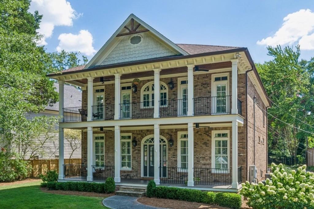 Welcome to this Stunning Custom Brick Home in the Heart of Brookhaven where Quiet Luxury meets Unmatched Convenience. Perfectly perched on a hilltop on a peaceful street, this show-stopping residence offers the rare opportunity to live just steps from the Brookhaven Farmers Market, Fernwood Park, the local library, and the buzzing shops and restaurants of Dresden Village. From the moment you arrive, the curb appeal is undeniable. A Rare Double Veranda Porch with Tongue-and-Groove Ceilings and Cooling Fans offers the perfect perch to sip coffee, wave to neighbors, and watch the quiet rhythm of the community unfold below. It's the kind of porch that makes you pause and stay awhile. Inside, Sophistication and Functionality shine in every corner. A Two-Story Foyer with Oversized Windows welcomes natural light to pour into the airy, open layout, where 10-Foot Ceilings, Detailed Crown Molding, and Rich Hardwood Floors set the tone for elevated living. To your left, a Handsome Office with Arched Built-Ins creates a true work-from-home retreat. The Living Room is both Stylish and Inviting, featuring a Classic Brick Fireplace, Custom Built-Ins, and Coffered Ceilings. At the Heart of the Home, the Chef's Kitchen is a true showpiece outfitted with a Wolf Range and Custom Hood, Quartzite Countertops, Double Oven, Butler's Pantry, Wine Cooler, and a Statement Island for gathering. White Zellige Subway Tile and Crisp Cabinetry deliver a timeless, tailored finish. A Casual Breakfast Nook opens to the kitchen, while a Formal Dining Room with Wainscoting and Oversized Windows adds elegance for entertaining. A Stylish Powder Room completes the main level. Upstairs, the Oversized Primary Suite offers a Serene Escape with Room for a Sitting Area, a Built-In Wet Bar for your morning coffee, and Two Massive Walk-In Closets. The Spa-Like Bath features Marble Tile, a Soaking Tub, and a Steam Shower worthy of a five-star retreat. Three Additional Spacious Bedrooms and Two Full Baths round out the upper level, ideal for families or guests. The Fully Finished Daylight Terrace Level is made for Entertaining with a Large Living Space, Built-In Sound System, Wet Bar framed by Brick Archways, and Direct Access to a Charming Outdoor Patio. An Additional Bedroom and Full Bath provide the perfect guest suite, while an Unfinished Space offers flexibility for a Home Gym, Workshop, or Extra Storage. Out back, a Covered Patio with a Built-In Fireplace and Ceiling Fan allows for Year-Round Outdoor Living. The Flat, Fully Fenced Backyard is perfectly manicured and ideal for play, pets, or your dream garden. American Boxwoods, English Ivy, and Lush Zoysia Grass supported by a Modern Irrigation System create a landscape that is both Low-Maintenance and Magazine-Worthy. A Rare Three-Car Garage and Attic Storage ensure space for everything. And best of all, this incredible home is just a Sidewalk Stroll from Everything that makes Brookhaven special from the Saturday Farmer's Market to Sunset Cocktails at Valenza to Boutique Shopping and Local Favorites along Dresden. You're also moments from Incredible Restaurants like Haven, Verde Taqueria, Dixie Q BBQ, Vero Pizzeria, Grindhouse Burgers, and Honeysuckle Gelato with even more openings coming soon. Grab your essentials from Savi Provisions, hop on the nearby Brookhaven MARTA Station for a quick commute, or look forward to the brand-new Brookhaven City Hall opening this summer. This is not just a house it's a lifestyle. A True Brookhaven Beauty with every Luxury Detail, in one of Atlanta's most Sought-After Neighborhoods.
