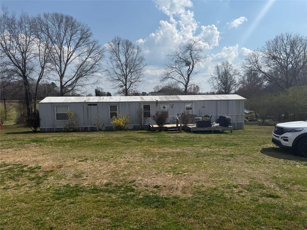 This unique property offers two mobile homes set on spacious acreage, making it ideal for a family homestead or investment opportunity. Enjoy the flexibility of multi-generational living, rental income potential, or simply extra space for guests.The land features a barn perfect for storage, animals, or hobby farming and a natural water spring at the back of the property, adding charm and sustainability. With plenty of open space, you’ll have room for gardening, outdoor activities, or expanding your vision for country living.Don’t miss out on this one-of-a-kind property with both income potential and natural beauty.
Both tracks will be sold together.legal descriptions as follows 10-62 TRK 2 PB 53-26 58-293 DB 1206-245and 10-62 PB 53-26,58-294 DB 1206-245 PLEASE DO NOT DISTURB TENANTS. showings by appointment only.