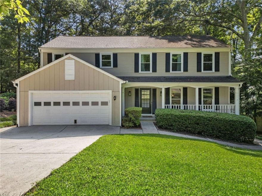Don’t miss this rare opportunity in East Cobb’s sought-after Heritage Glen! This move-in ready 4-bedroom, 2.5-bath home combines timeless curb appeal with the modern updates today’s buyers are looking for—but it won’t last long. With nearly new interior paint and gleaming hardwood floors throughout the main level, the home welcomes you with light-filled living spaces and a flexible floor plan perfect for both daily living and entertaining. The cozy fireside living room flows seamlessly into the updated kitchen, featuring granite countertops, stainless steel appliances, and crisp white cabinetry. The dining area offers just the right amount of separation while maintaining an open feel as it connects to the kitchen and the versatile bonus/flex room. Upstairs, the oversized primary suite includes a walk-in closet and a beautifully updated private bath with a freestanding soaking tub. All secondary bedrooms are generously sized. Enjoy additional living space in the screened-in deck overlooking the wooded backyard—perfect for morning coffee or evening relaxing. The fully fenced, level backyard also includes a patio ideal for grilling and play. Recent upgrades include new windows, HVAC, updated lighting, and thoughtful cosmetic improvements throughout. Located in a well-established community with top-rated schools, no HOA, and easy access to parks, shopping, and dining, this home offers unbeatable value in East Cobb. Schedule your showing today—this one will go fast!