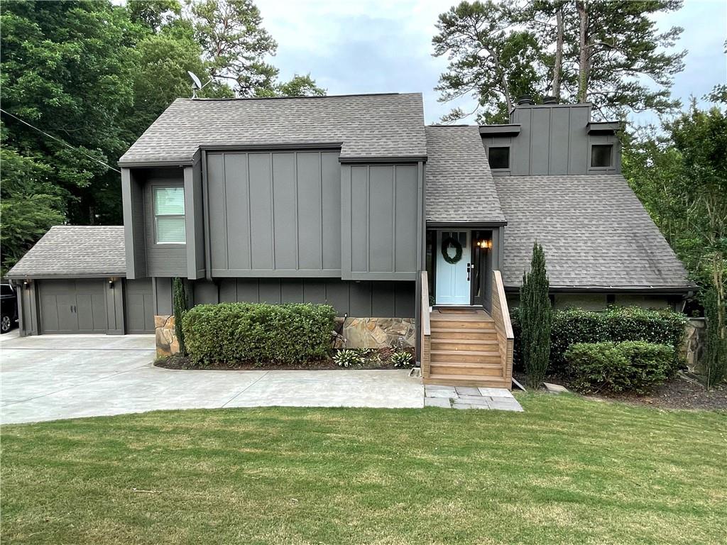 This one is a must see! In the heart of East Cobb, walking distance to top-rated Walton High School, this fully renovated split-level contemporary home has luxury finishes and fixtures throughout, open-concept main level w/ white-oak hardwoods, dining room, large family room w/ fireplace and vaulted wood beam ceiling, eat-in kitchen, SS appliances, full laundry/mud room w/ W/D hookups, secondary living room w/ fireplace, one full bedroom w/ ensuite full bath on main, upstairs offers family room w/ fireplace, king-size master w/ double closet, double vanity in master bath w/ glass shower, two secondary bedrooms w/ hallway bath w/ shower/tub combo, two-car garage w/ extra driveway parking, amazing outdoor entertainment areas w/ spacious rear deck overlooking pond, fire-pit and custom-built tree house. This home is AS-IS. Conveniently located to schools, dining, shopping and more. Price and/or availability date may change without notice. Pets considered and accepted on a case-by-case basis. Breed restrictions apply. Lease term is a minimum of 12 months. Application fee is non-refundable $65 per adult over 18 years of age. One-time non-refundable move-in fee due prior to lease commencement. Commission will be paid to the selling broker who shows the property.