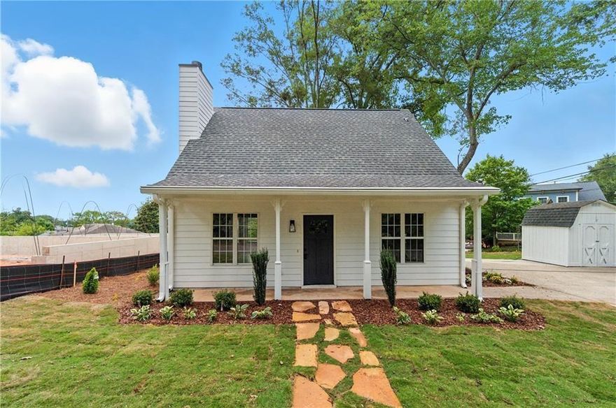 Discover this beautifully renovated two-story home just steps from the vibrant Marietta Square! Located in the heart of the City of Marietta, you’ll enjoy easy access to charming shops, dining, parks, and top-rated schools. This 2-bedroom, 2-bath home combines modern updates with cozy character, featuring a warm fireplace and an open, functional layout perfect for both everyday living and entertaining. Situated on a spacious corner lot, the property offers excellent curb appeal, extra privacy, and plenty of outdoor space. Inside, you’ll find a brand-new kitchen with stainless steel appliances, sleek cabinetry, and updated countertops. Additional upgrades include fresh paint, new flooring, stylish light fixtures, new interior & exterior doors, and completely renovated bathrooms. Additionally home comes with a new alarm alarm system. Move-in ready and full of charm—this is one you don’t want to miss! Call about incentives.