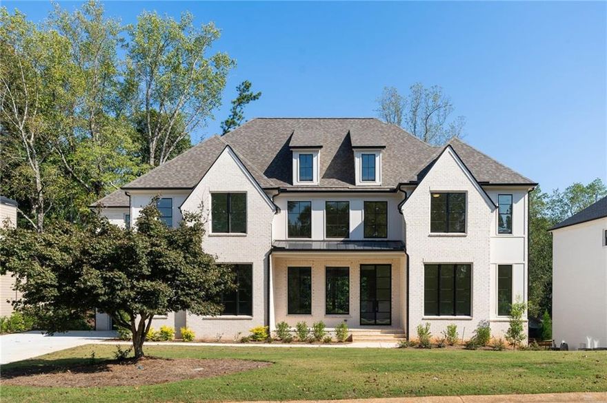 PLEASE WATCH THE VIRTUAL TOUR............Built by Capital Design Homes, this newly constructed home is a true masterpiece expertly designed to impress both inside and outside. This ideal home has an elegant open/airy design concept with timeless charm and modern sophistication that combines all the must haves on your wish list. This home has a prime location, exceptional workmanship and a desirable community situated on a spacious private lot, creating an ideal setting for a future pool. An outside bathroom/changing room with an easy access from the pool is already part of the design of this house. The home's centerpiece, the combination kitchen, living and open dining area, enjoys a sense of expanse from the wall to wall windows lining the rear of the house open to the covered porch. The main level showcases a grand 12' ceiling with an abundance of natural light that floods the house through 8' tall windows and 10' tall sliding doors. The professional grand kitchen offers ton of cabinets an oversized island with seating, high-end stainless appliances and adjacent chef's / scullery kitchen. The primary luxurious bedroom suite features an extra high ceiling, sitting area, two separate vanities, oversized shower, a freestanding bathtub and a huge walk-in closet. All 4 secondary bedrooms feature walk-in closets and ensuite accommodations. The unfinished 2300 sq ft terrace level is massive and occupies the entire footprint of the house. There is plenty of space for an open recreation area, bedroom, full bath, half bath, bedroom could have direct access to the outside, separate bath for future pool and more. This beautiful new home is ready now!
