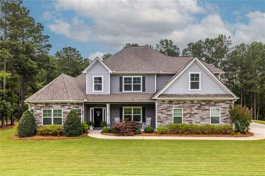 What a TERRIFIC BUY!!!!! Come see this one today - large story and a half craftsman floorplan. Enter an inviting two story foyer with a large living room to your left, now being used as an office and to your right is a large formal dining room w/coffered ceiling. The kitchen is spacious with all the bells and whistles, granite countertops, gas surface unit, double ovens, soft close cabinetry and a huge walk-in pantry. The great room is off the kitchen with an informal eating area and half bath. The master suite is on the main floor with a huge bath featuring a separate soaking tub and walk-in shower. Oh have you always wanted a designer closet with island storage. It's here as well!! Two guest bedrooms which share a full bath are also on the main level. Upstairs is a fourth bedroom, playroom and another full bath. There's also a huge storage room upstairs. This sits on an acre plus manicured lot with a shed for all those tools and a large wooden playset for the children. Make that appointment today !!