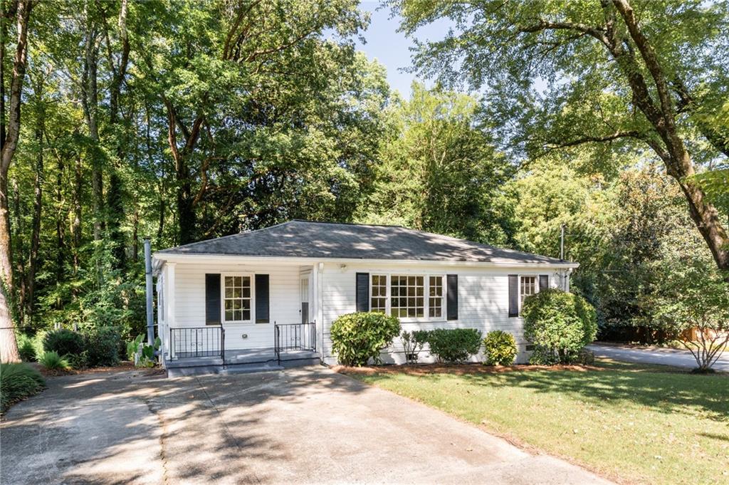 Adorable bungalow in the PERFECT location. Situated on a rare corner lot right in the middle of Briarcliff Heights, this one is a true gem. With some love and updates it's ready to be a showstopper. The lower level has income producing potential w/ it's own entrance, full bathroom, and even dedicated parking separate from the main house! Also included is a private, fully fenced, backyard thats on everyone's wishlist. Bring your imagination and sweat equity to turn this place into your dream home!