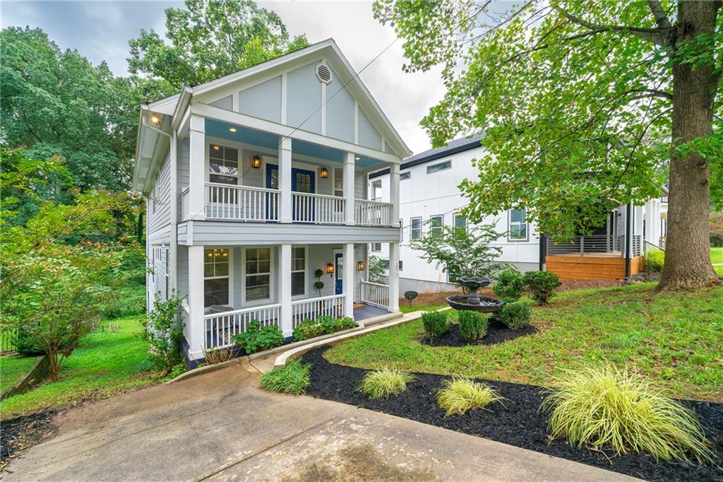 Step into a world of timeless elegance in this captivating Craftsman home, nestled in the heart of Historic College Park.
A grand double-fronted porch beckons you to unwind and soak in the idyllic neighborhood charm. French doors seamlessly connect the recently renovated kitchen and expansive back deck, creating a flowing haven for entertaining. Imagine starlit gatherings under the Georgia sky, with the gentle murmur of the year-round creek as your soundtrack. Lush perennials and a rustic stone border add a touch of whimsy, transporting you to a serene mountain retreat. Inside, spacious living and dining areas effortlessly flow, inviting connection and shared laughter. The master suite is a haven of tranquility, boasting a vaulted ceiling, a cozy fireplace, and private access to a charming upper-level porch. This exceptional location places you within walking distance of Barrett Park, with easy access to the airport, Delta, Porsche, Tyler Perry Studios, and Woodward Academy. Don't miss this rare opportunity!
Schedule your showing today and discover your new home; a place where elegance meets comfort, and memories are made to last.