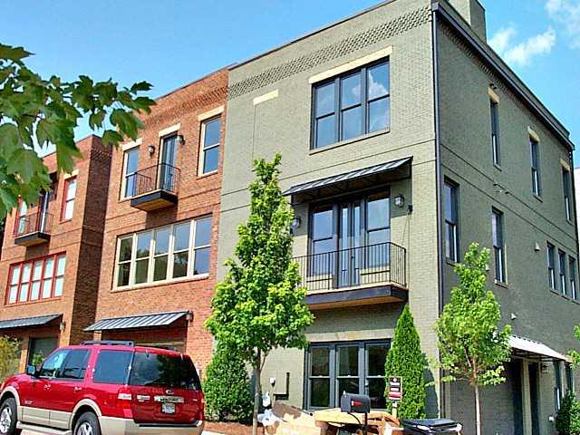 Large open townhome, with chase for an optional elevator, and an outdoor patio/gardening area. This 3 bdrm home is full of hardwoods, 10' ceilings, Granite in kitchen. This home is located in a mixed use neighborhood with a retail village, shops, services, restaurants, YMCA, parks and ponds....