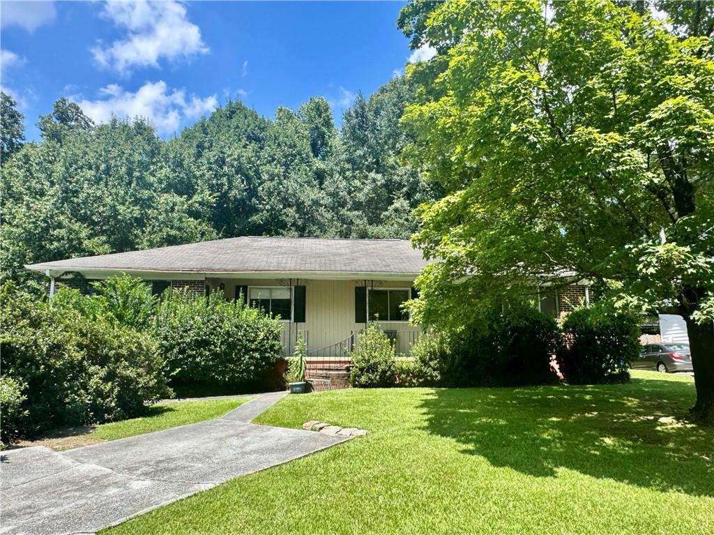 Rare opportunity in the heart of Brookhaven! This tear-down duplex sits on a deep, level lot just over half an acre in the sought-after Ashford Park neighborhood. Surrounded by multi-million-dollar homes, the property offers endless potential to build your dream home or an investment property. Current R-85 zoning. Conveniently located near MARTA, top-rated dining, shopping, and parks. Prime location with easy access to Buckhead, Chamblee, and major highways.