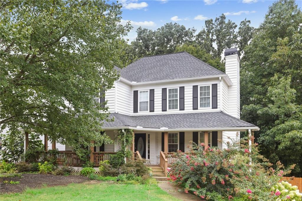 Perfect East Cobb location just a mile from I-75 to deliver you anywhere you want to be in minutes. Who does not love an adorable front porch! This completely renovated home offers so much. Enjoy the evenings watching the hustle of the neighborhood as you sit under your beautiful trees as the sun goes down. The updated kitchen with all white cabinets and top of the line appliances is inviting and perfectly situated to enjoy the beautiful natural backyard where you can enjoy family time on the elevated deck overlooking your fur babies in this completely fenced in backyard. It will become their favorite oasis. The office and open concept living room space will be perfect for those of us that want to stretch out as we enjoy our loved ones in front of the fireplace or sharing timing cooking. The owner's suite with it's oversized shower and walk-in closet are a sight to behold. You will love it. Nothing was overlooked in this renovation including a EV charger in the garage. The basement has become a versatile space for a teen hangout, office, gym, media center or whatever hobby you are looking to enjoy. This lovely home is priced to sell as the owners are eager to move on to their next adventure.