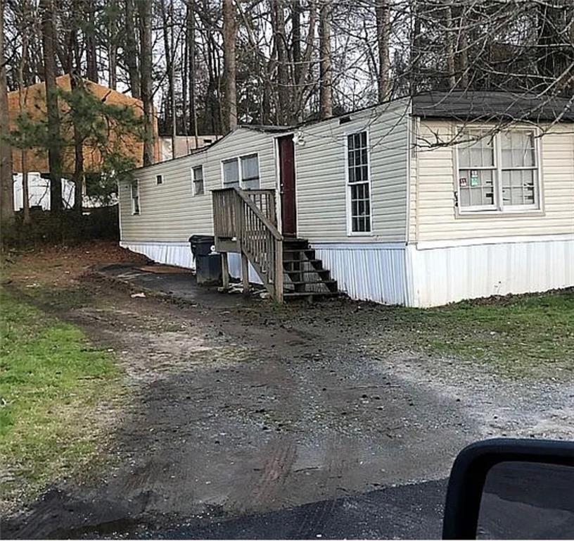 Affordable Housing Opportunity: Move in ready! Stop paying rising rent costs and own this spacious 2 bed x 1 bath home with a huge lot size. Tara MHP is an all-age manufactured housing community providing comfort and affordability for individuals and families.
Conveniently located within minutes of 75 South and 15 minutes from downtown Atlanta, with a 2-minute walk to the transit bus stop. The community is surrounded by restaurants, stores, and a hospital. Lot rent is $575 per month plus water and trash. The home is totally electric, and applicants must pass a criminal background check with the park manager.
Title is in hand, and you have the option to stay in the park or relocate the home. All appliances included with sale. Seller is Motivated and willing to negotiate.