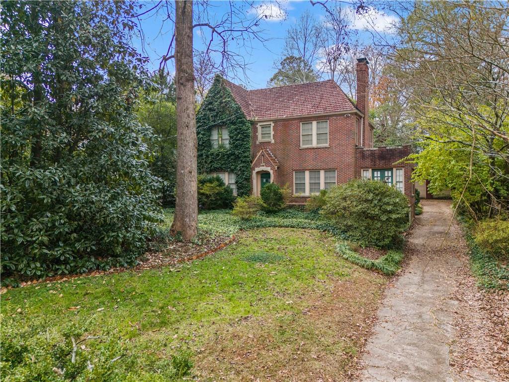 After a few weeks of preparing this property for showing, we are ready to fully bring
this rare opportunity to the market. If you’ve got any interest in creating your
custom forever home right on the Druid Hills Gold course, here’s your chance. The
architectural details of this historic home are stunning; from the limestone accents
to the slate roof, to the arched doorways and built in phone boxes, this 1929 gem is
ready to be brought into the 21 st century. Currently a 3 bedroom 2-1/2 bath home
(just under 3000 square feet) the new owner can opt to renovate the existing
structure, OR seek to expand out the back to create additional square footage.
The property itself is currently a blank canvas waiting for the introduction of a pool
complex, carriage house, or simply create a manicured in town oasis shared with
the course, giving great site line to the beautiful gold course vista. Additionally we
have received permission to clear the undergrowth on the other side of the property
line, which will further enhance this beautiful view. This is a must see for anyone
interested in creating their own golf course masterpiece.